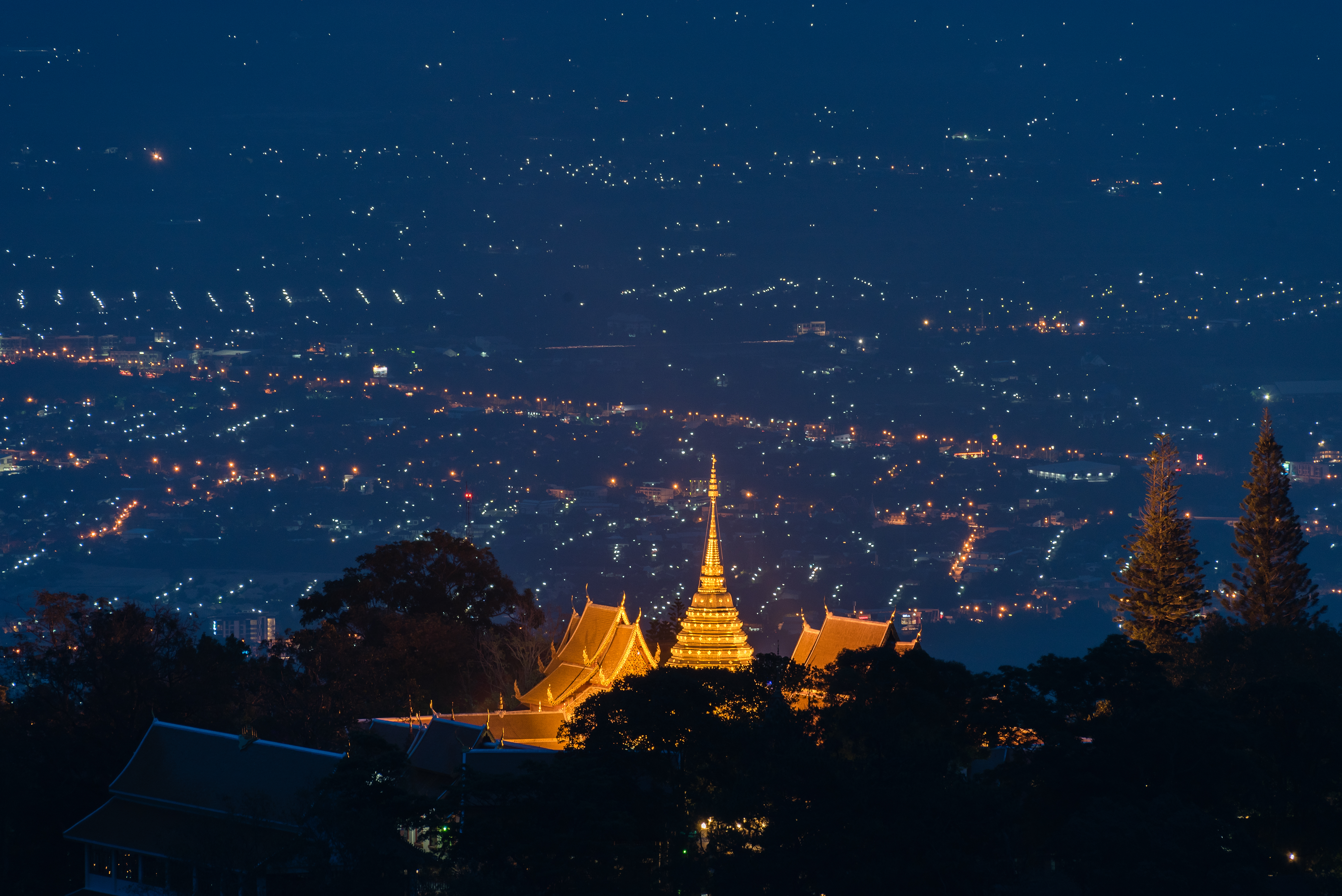 Golden chedi of Wat Phra That Doi Suthep atop Doi Suthep mountain overlooking Chiang Mai